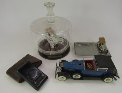 Automobilia related trinkets, comprising a glass car in case, ashtray with car emblem, kodak camera and a battery powered model car. (4) - 2