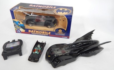 A Corgi diecast 1960's DC Comics Batmobile, scale 1:24, boxed, together with a further Batmobile 2000, a Batman Communicator, and a further earlier diecast Batmobile, Batman lacking, together with a Corgi diecast Eddie Stobart limited Volvo curtainside tr - 3