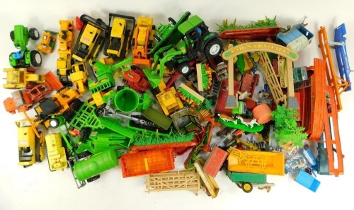 Tonka, Matchbox, Britains and other diecast, including Tonka bulldozer, Matchbox Kingsize number K3 hatch retractor shovel, Matchbox Superkings K5 Muir Hill tractor and trailer, Matchbox R series Kingsize number K8 Caterpillar Traxcavator, Corgi Juniors d