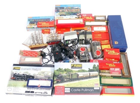 Hornby power units, OO gauge rolling stock and locomotive boxes, etc. (3 boxes)