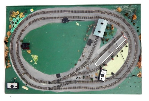 A model railway train track board, 154cm x 100cm.