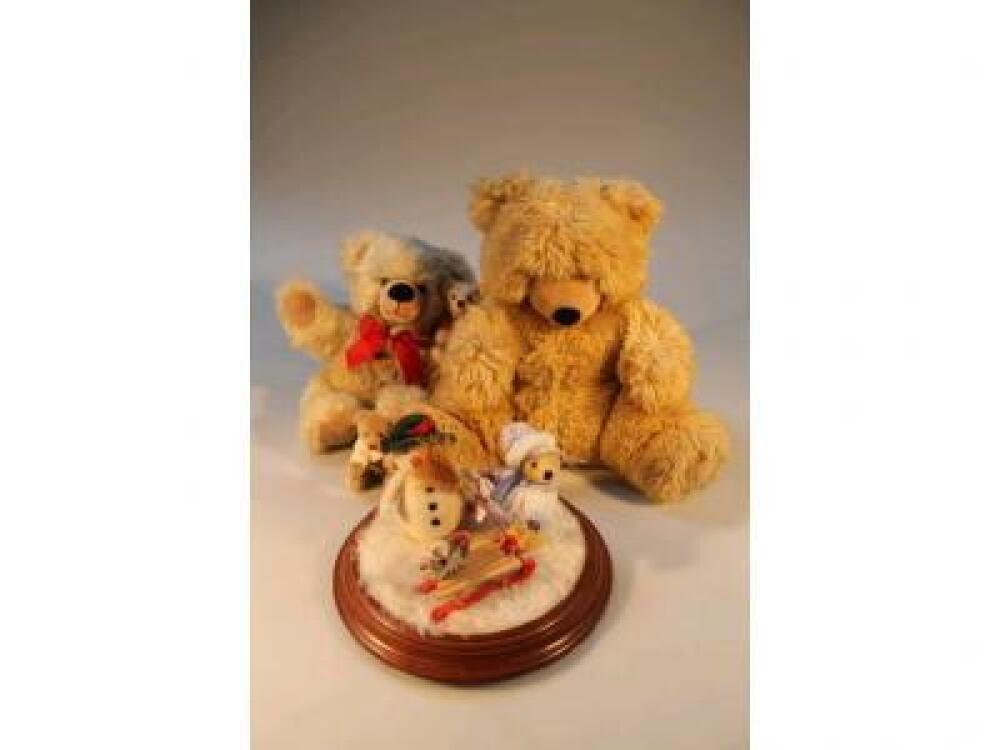 A Steiff Winter diorama depicting a small bear with a sledge