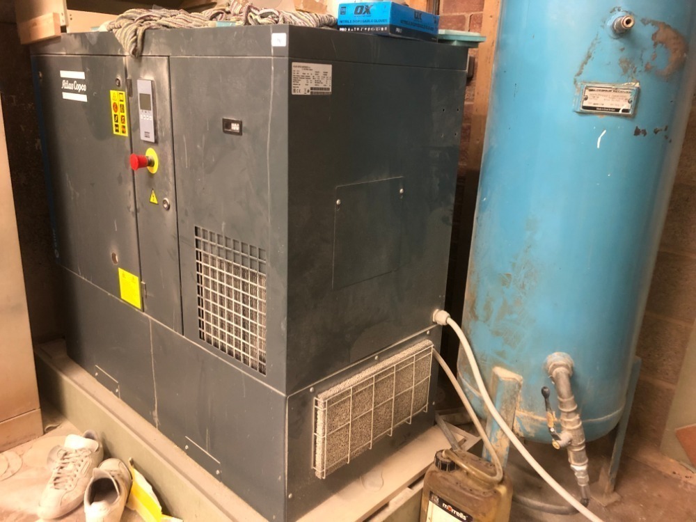 An 2021 Atlas Copco compressor, model G11FF, and tank. Note: VAT is ...