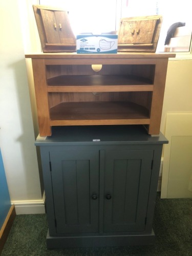 A cupboard and TV stand. (2) Note: VAT is payable on the hammer price of this lot at 20%.