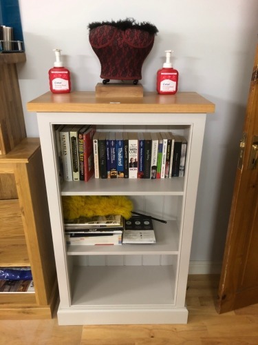 A painted bookcase. Note: VAT is payable on the hammer price of this lot at 20%.