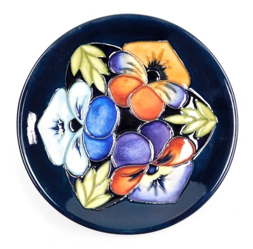 A Moorcroft pottery Triple Choice pattern pin dish, Moorcroft Collectors Club 2005, painted and impressed marks, 11.5cm wide.