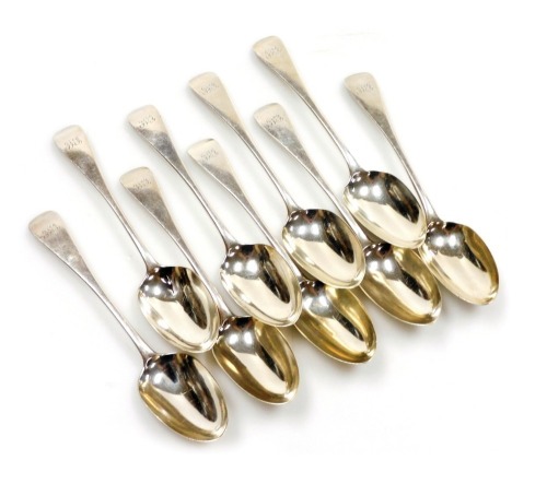 A set of nine Victorian silver Old English pattern dessert spoons, monogram engraved, Goldsmiths Alliance Limited, London 1869, 12.43oz.