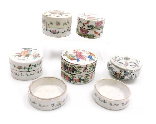 A small group of Chinese famille rose porcelain circular boxes, all with hand painted decoration of figures, flowering branch decoration, birds etc, five boxes with covers and two bases, the largest box 9.5cm diameter x 6cm high.