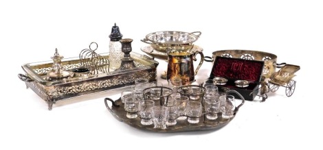 Plated wares, including a six division toast rack, condiment set, pair of salts, boxed, serving tray with glass tots, etc.