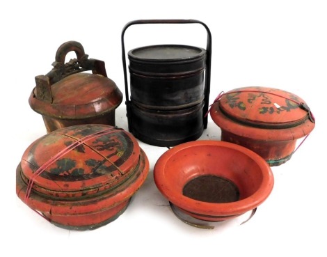 Two Chinese red lacquered wooden food containers, a bowl, rice bucket, and a tiffin box. (5)