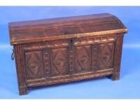 A 17thC/18thC oak coffer with slightly domed hinged lid