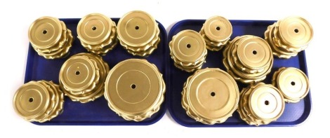 A group of Chinese gold painted hardwood circular stands. (2 trays)