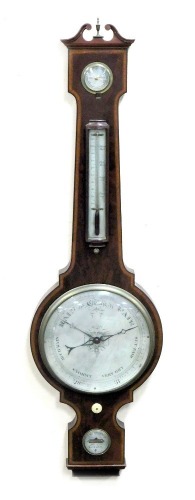 A Georgian mahogany wheel barometer, by J Smith, 15 Palace Row, New Road London, with a silvered dial, dry damp dial, and thermometer, the case with satinwood cross banding, 109cm high.