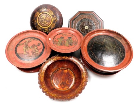 A group of Chinese red lacquer dishes, bowls and lids. (a quantity)