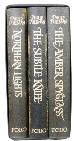 Pullman (Philip). His Dark Materials, 3 vols, comprising Northern Lights, The Subile Knife, and The Amber Spyglass, with slipcase, published by The Folio Society.