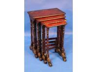 A set of 19thC red lacquered quartteto tables