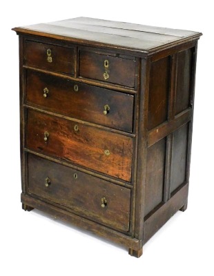 A 17thC style oak chest, of two short over three long graduated drawers, raised on block feet, 114cm high, 89cm wide, 63cm deep.