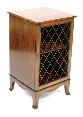 An Edwardian mahogany and crossbanded pot cupboard, with a brass grille door, raised on outswept feet, 76cm high, 43cm wide, 43cm deep.