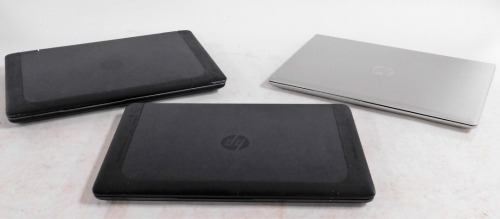 Three HP laptops, being two Z Book and one Probook.