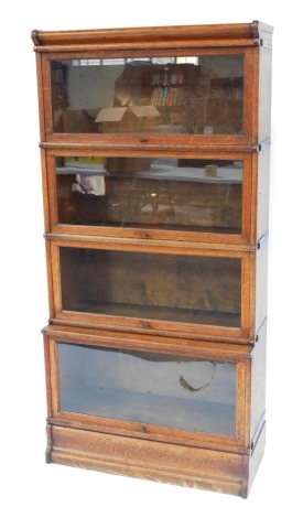 A 20thC oak Globe Wernicke bookcase, formed in four sections, stamped, 160cm high, 85cm wide, 28cm deep.