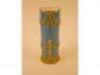 A French turquoise porcelain cylindrical vase after Sevres with gilt metal mounts