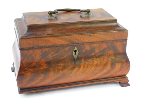 A George III flame mahogany bombe tea caddy, with brass swan neck handle on ogee bracket feet (AF), 17cm high, 26cm wide.