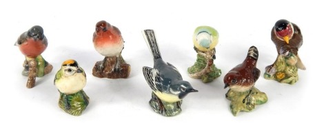 A group of Beswick pottery birds, comprising Chaffinch 991, Grey Wagtail 1041, Blue Tit 992, Wren 993, Robin 980, Gold Crest 2415, and Goldfinch 2273. (7)