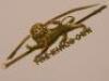 The Kings Own Regimental bar brooch stamped 15 carat