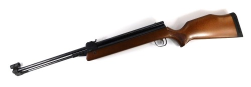 An Earling Armament Co .22 calibre air rifle, model HR81, with wooden stock, 110cm long.