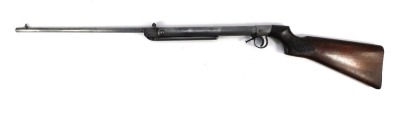 A BSA Dual Action air rifle, with walnut stock, No 2559, engraved handle, 105cm long.