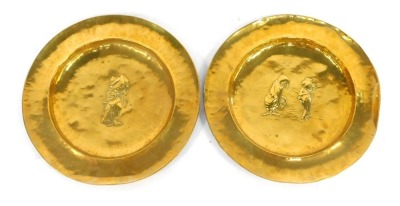 Two early 20thC Spital & Clark brass chargers, each depicting characters from John Tenniel Illustrations from The Alice in Wonderland Series, Queen of Hearts, and The Walrus and the Carpenter, each stamped verso, 38cm diameter. (AF) (2)