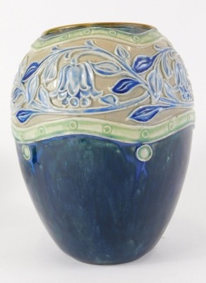 A Royal Doulton stoneware vase, with sgraffito decoration of flowers and leaves, in blue within green bands, above a mottled blue base, indistinct impressed marks to underside, 20cm high. - 2