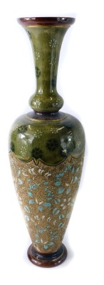 A Royal Doulton Lambeth stoneware vase, with a green glazed top and main body with turquoise and cream mottling, stamped to underside, 41cm high.