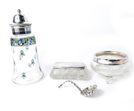 A silver topper rectangular dressing table jar, with pressed glass base, a silver plated topped and painted glass sugar sifter, silver caddy spoon, 0.43oz, and a silver rimmed and cut glass dressing table jar. (4)