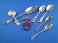 An 18thC Old English pattern silver dessert spoon