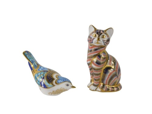 Two Royal Crown Derby paperweights, comprising a seated tabby cat, with silvered stopper, 13cm high, and a Mountain Bluebird, with silvered stopper, 13cm wide. (2)