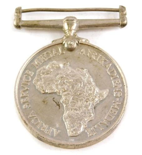 A reproduction Africa service medal.