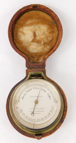 A Callaghan of London travel barometer, in a brass case with silvered dial, 6.5cm diameter, in fitted case.