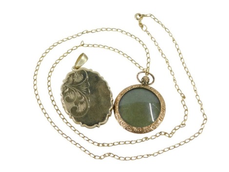 A 9ct gold locket, with a fluted outer border and engraved scroll decoration, 7.1g, and a gold plated locket on 9ct gold fine link neck chain, 54cm long, 2.2g. (2)