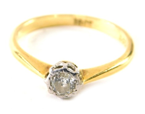 An 18ct gold diamond solitaire ring, size N, 2.6g all in.