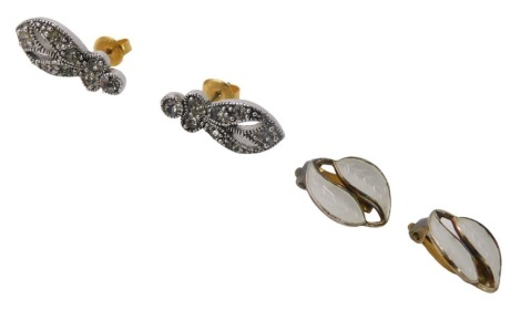 Dress earrings, comprising a pair of silver and enamel clip earrings, and a pair of marcasite and paste stone set earrings. (2)