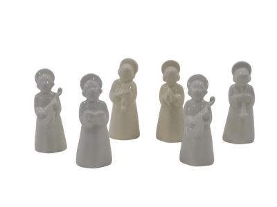 Six Danish angel figures, in cream and white, beehive stamp to underside, 9.5cm high.