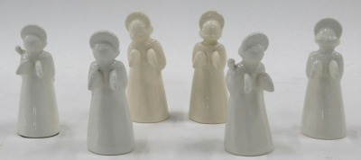 Six Danish angel figures, in cream and white, beehive stamp to underside, 9.5cm high. - 2