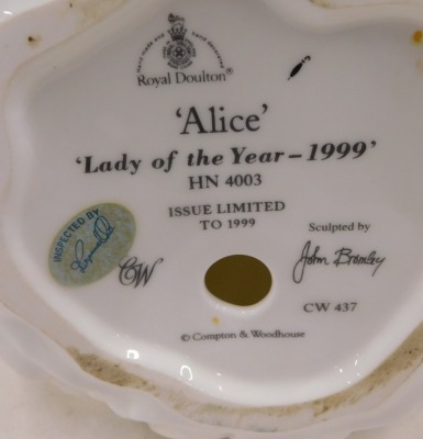 Two Royal Doulton figures, Alice Lady of The Year 1999, and The Royal Doulton Classics Christmas Day 2002, 21cm high respectively. - 3
