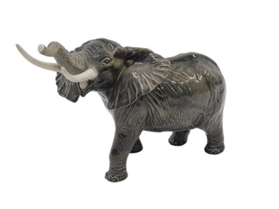 A Beswick elephant figure, 25cm high. (AF)