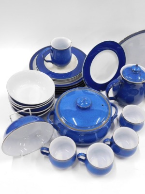 A Denby Dark Blue pattern part tea and dinner service, comprising teapot, six teacups, six saucers, nine side plates, four medium plates, six dinner plates, oval serving tray, milk jug, gravy boat, oval meat plate, salt and pepper, tureen and cover, and s - 2