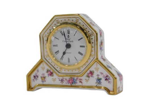 A Royal Crown Derby Royal Antoinette pattern mantel clock, 10cm high, boxed.