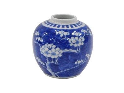 An early 20thC Chinese blue and white ginger jar, with cherry blossom and two ring stamp to underside, 9.5cm high.