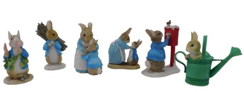 A group of Royal Albert Beatrix Potter figures, comprising Benjamin Bunny, Peter with Post Bag, Benjamin Ate a Lettuce Leaf, Peter Rabbit Gardening.