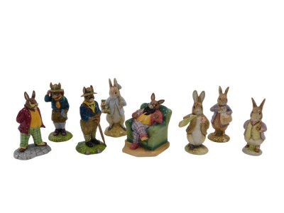 Six Peter Rabbit figures, comprising Peter in Watering Can, Mrs Rabbit and Peter, Mrs Rabbit and Peter mini figurine, Peter Carrying Sticks mini figurine, Peter Ate Some Radishes, and Peter Rabbit Posting a Letter, the largest 7cm high and four Bunnykins